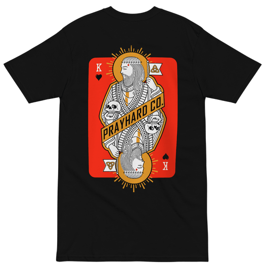 Black t-shirt with a graphic design of a playing card featuring a skeleton and 'Prayhard Co.' text on a red background.