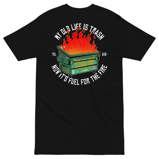 Black t-shirt with a graphic design of a burning trash bin and text on the back, on a transparent background.