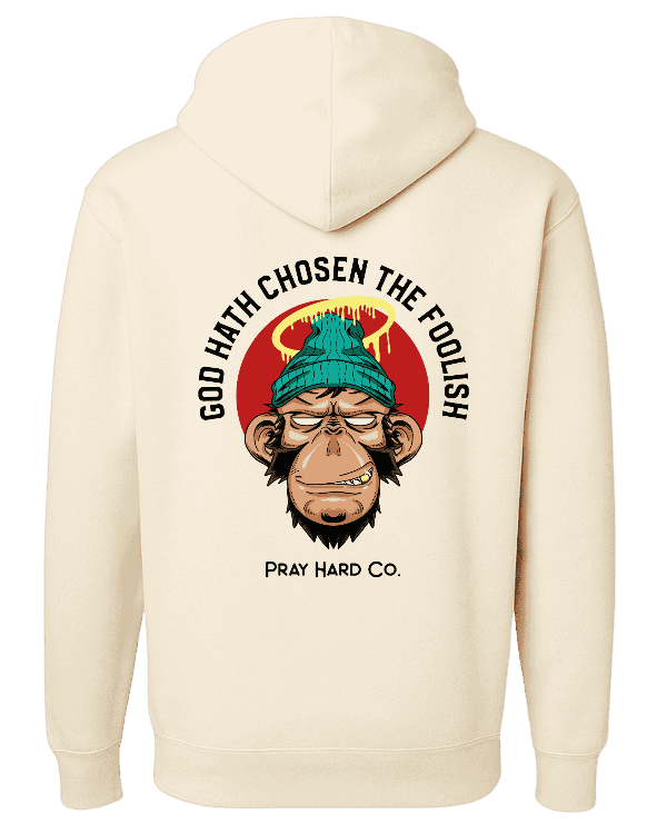 Cream hoodie with a graphic of a monkey wearing a green beanie and text on the back, on a green background.