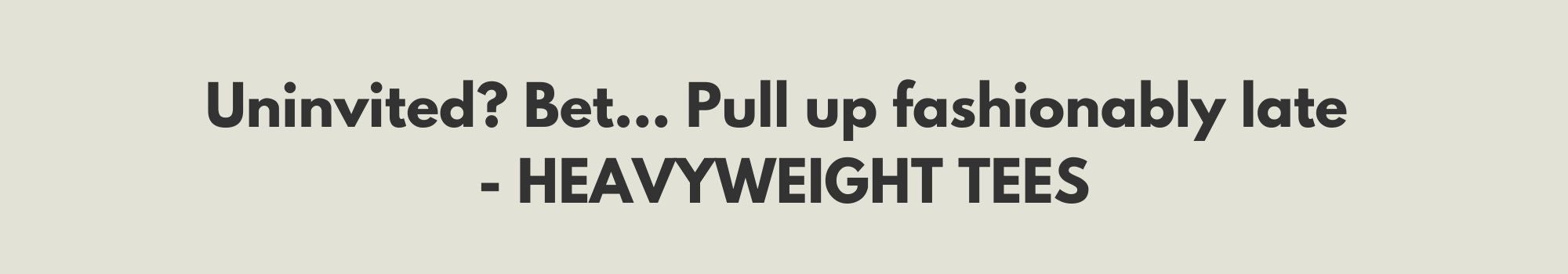 Text on a gray background with promotional message for 'HEAVYWEIGHT TEES'.